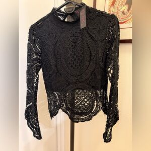 Sexy crochet knit style top. Size M.